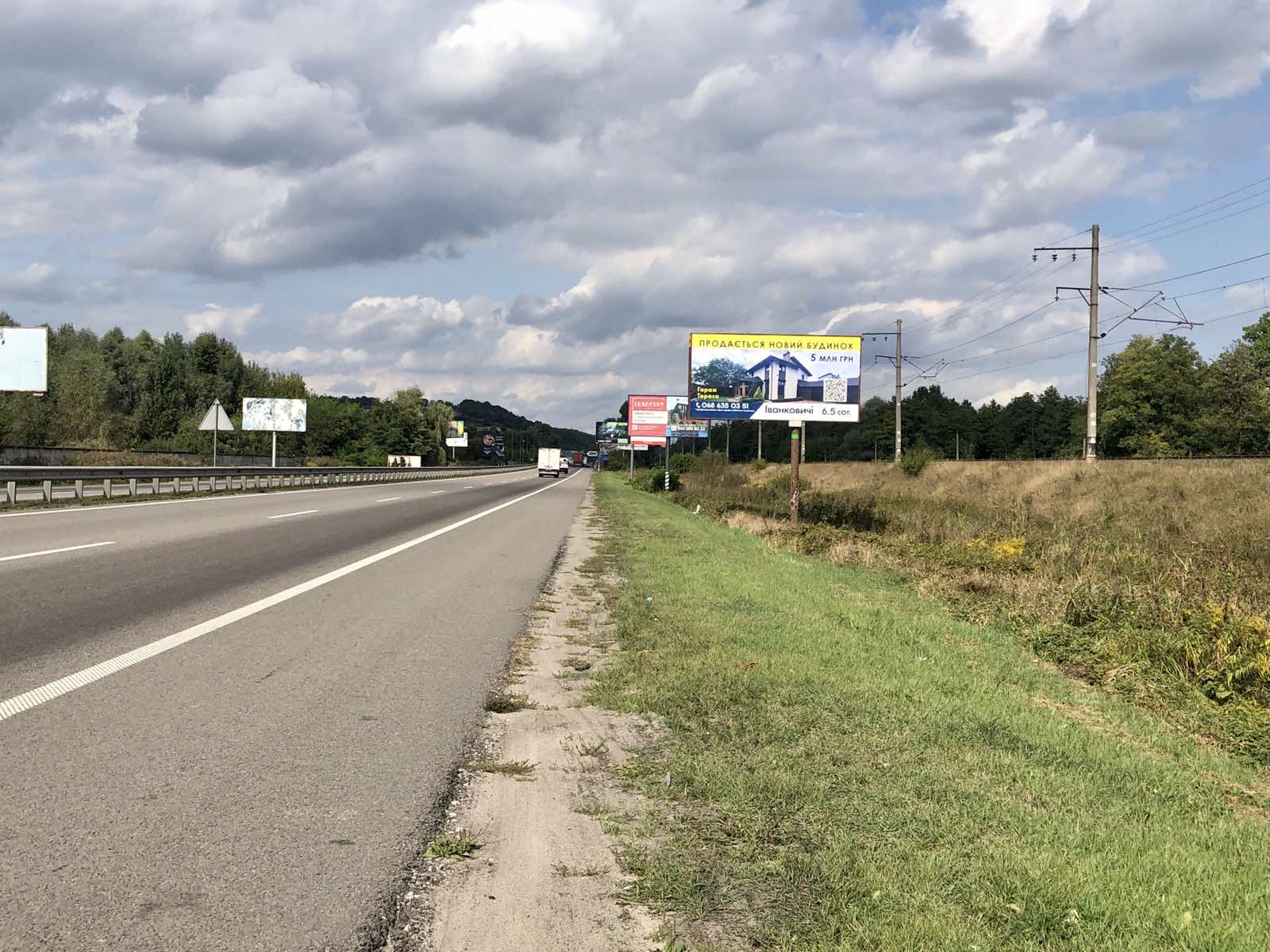 Billboard Khodosivka,  trasa Kiiv-Znam'anka, km 22+550 (livoruc), 3km 920m vid KPP Kieva, v napramku Kieva