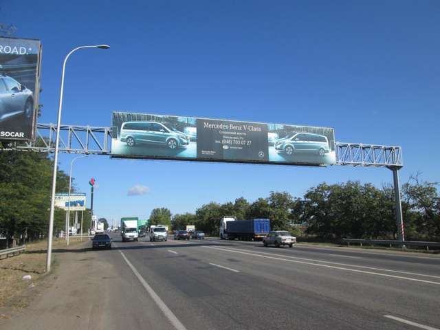 Billboard ,  M-05-01 Obhid m. Odesa, km. 23+800, pgt. Avangard (liva do rinku 7-j km)