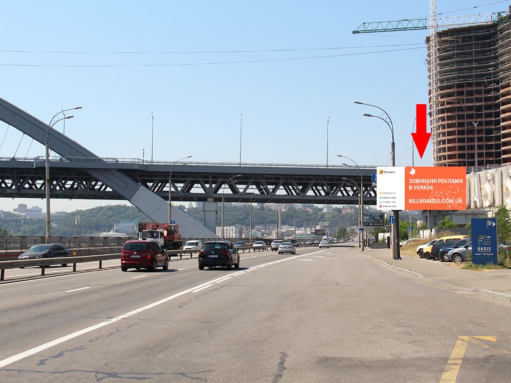 Prismatron, prism Kyiv,  Naberezno-Ribal's'ka st., pered Podil's'ko-Voskresens'kim mostom, v bik Podolu