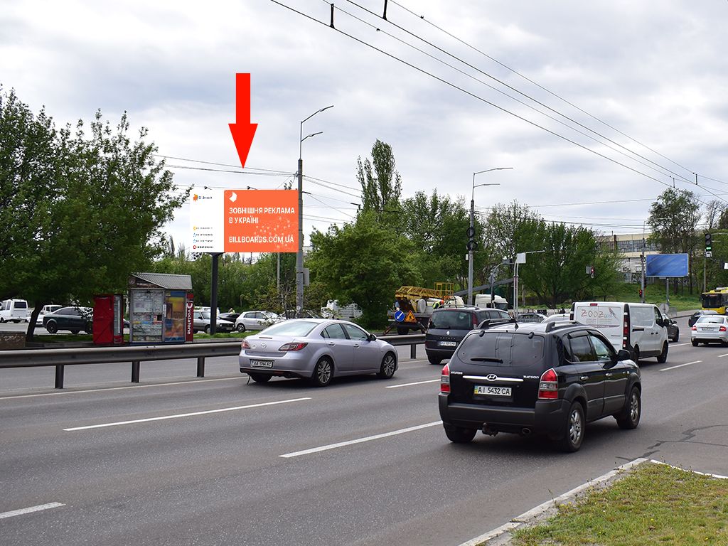 Billboard Kyiv,  Lugova st. - Sim'i Kul'zenkiv st. (kolis. Degtarenka st.), bila TRC "Karavan", na svitlofori, v storonu st. Avtozavods'ka, st. Visgorods'ka