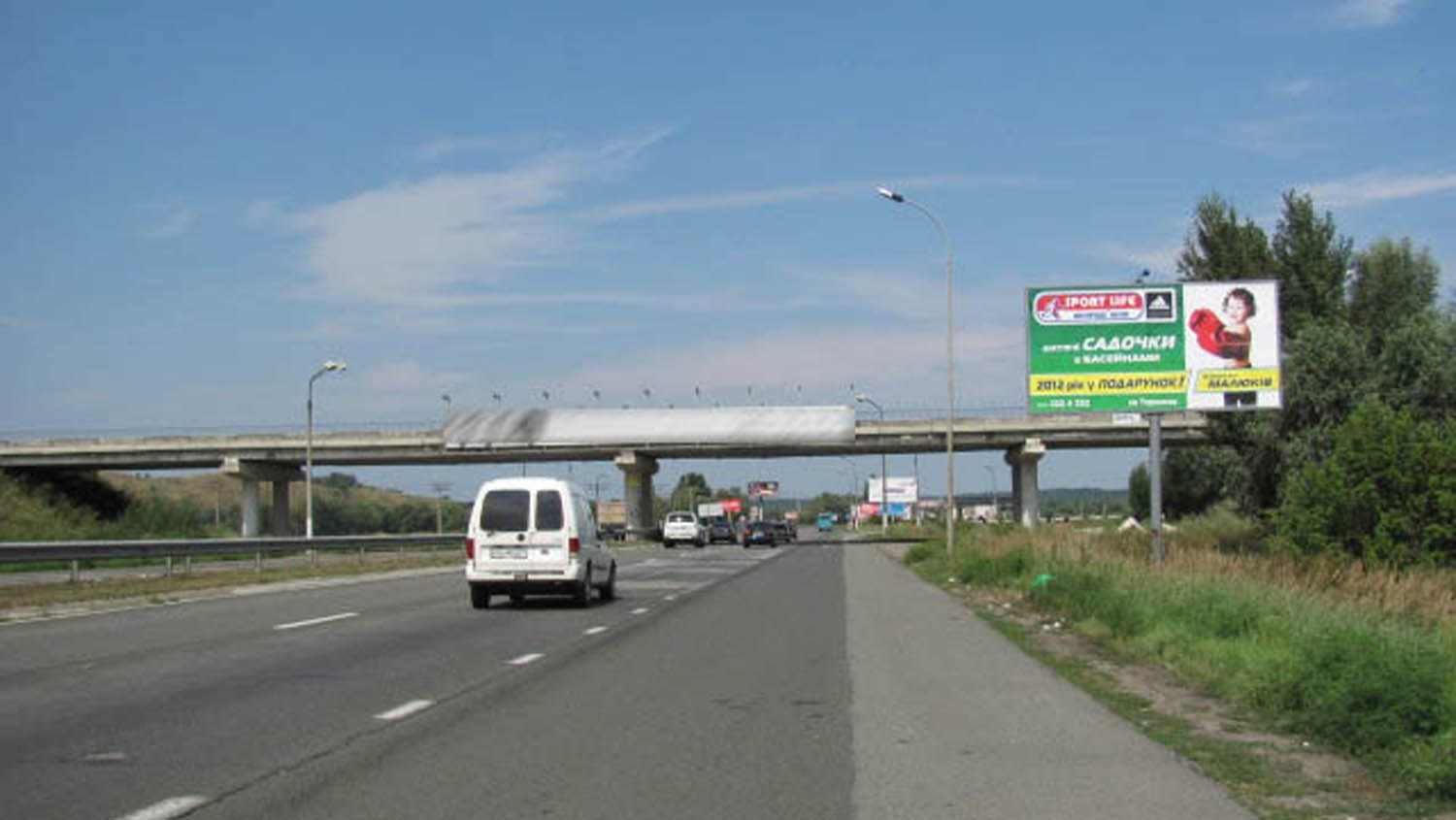 Billboard Pidgirtsi,  Dniprovs'ke sose, 25 +300 zliva, 50 m. do mostu, 50 m. pisla  A / C Pezo A
