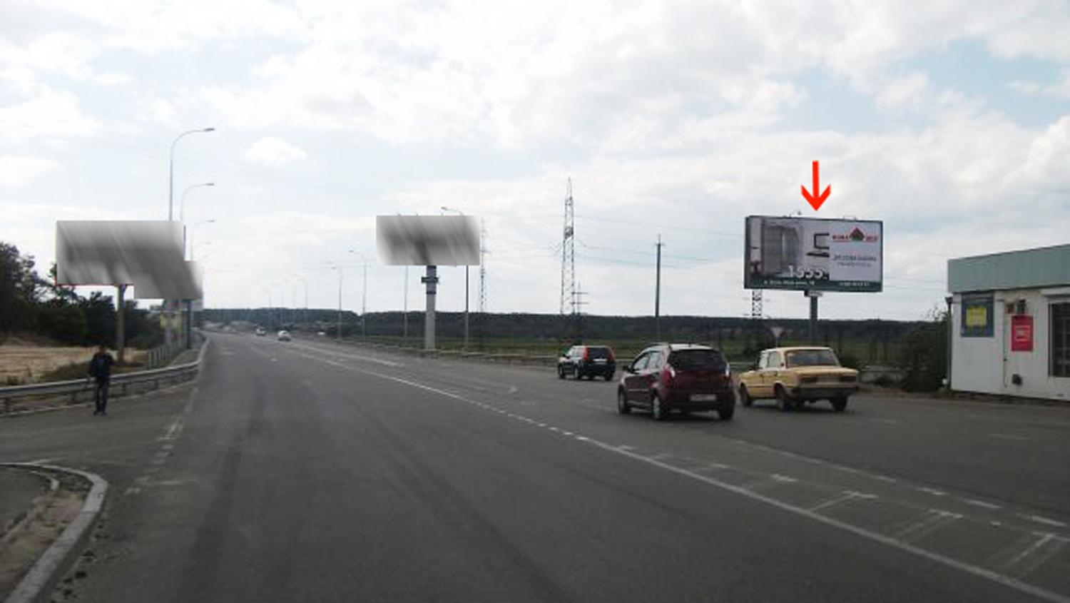 Billboard Gostomel,  Gostomel's'ka trasa, v`izd z m. Irpena pri v`izdi v m. Gostomel' za mostom bila ricki "Irpin'" naproti zapravki