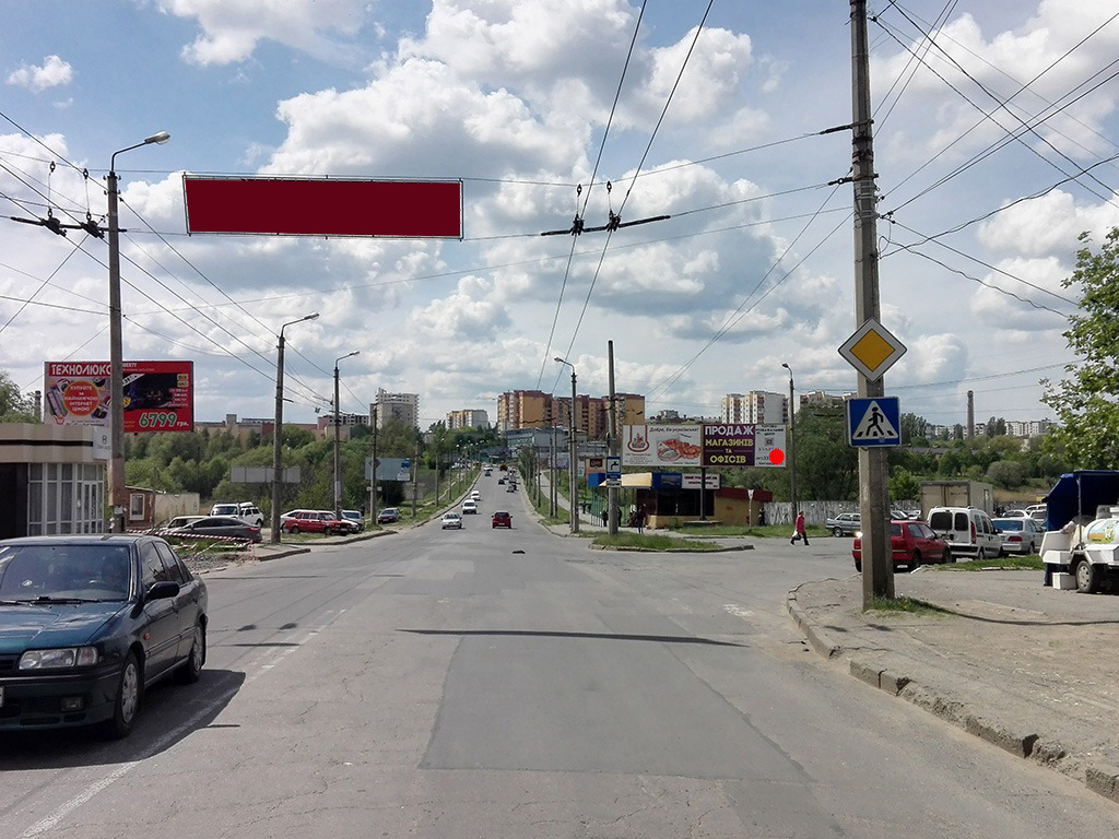 Billboard Khmelnitsky,  st.P.Mirnogo (TRC "Agora"). nepodalik: SOC "Bul'dozer", TRK "Agora", bagatopoverhova zabudova- massova (vid centru) [prave vuho]