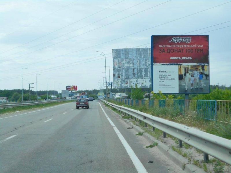 Billboard Irpin,  m. Irpin', trasa M-07 "Kiiv-Kovel'", km 22+950 pravo, mist cerez r. Irpinka, za 800m do rozvilki Irpin'-Gostomel'-Buca, ZK "Gostomel' Rezidens", verh