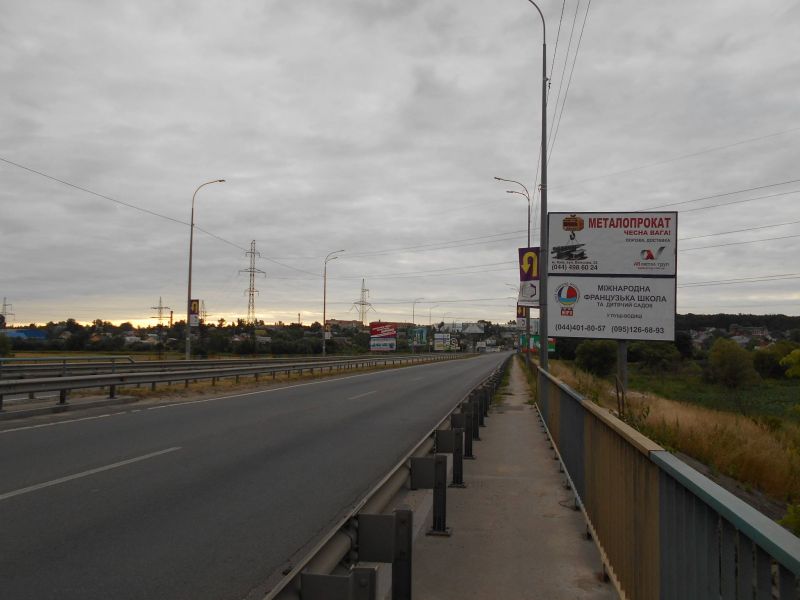 Billboard Irpin,  m. Irpin', trasa M-07 "Kiiv-Kovel'", km 23+100 livo, mist cerez r. Irpinka, cerez 650m pisla rozvilki Irpin'-Gostomel'-Buca, ZK "Gostomel' Rezidens", verh