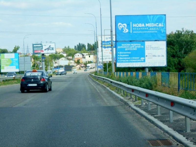Billboard Irpin,  m. Irpin', trasa M-07 "Kiiv-Kovel'", km 22+975 livo, mist cerez r. Irpinka, cerez 775m pisla rozvilki Irpin'-Gostomel'-Buca, ZK "Gostomel' Rezidens", niz