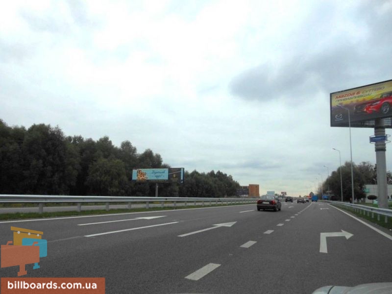 Billboard Khodosivka,  Dniprovs'ke sose, trasa N-01 "Kiiv-Znam'anka", km 23+950 livo, cerez 300m pisla povorotu na s. Hodosivku ta AZS UPG, navproti TC "MegaMarket", livij