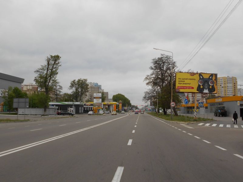 Billboard Brovary,   m. Brovari, st. Kiivs'ka, povorot na st. Metalurgiv, za 110m do TRC "Terminal" ta magazinu "MegaMarket", za 110m do AZS "KLO", za 265m do rozvilki z st. Pavla Cubins'kogo ta st. Simona Petluri, za 415m do povorotu na st. Vasila Stefanika, za