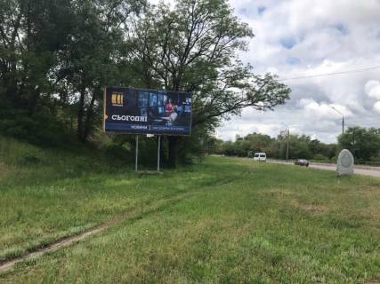 Billboard A in Zaporizhzhya o.Hortica, zizd z mosta Preobrazens'kogo v napramku mostika nad proizdzou castinou, uzdovz zal.kolii 170km+850 Photo 1