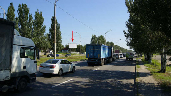 Billboard B in Dnipro (Dnipropetrovsk), 6х3  Donec'ke sose - st. Petrozavods'ka, napramok do TRC KARAVAN, bila svitlofora Photo 1