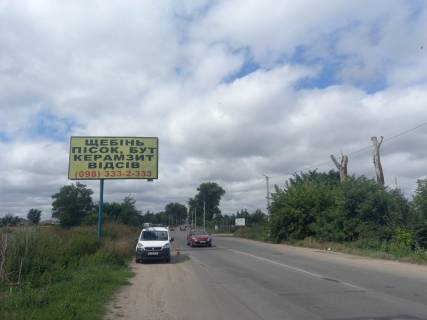 Billboard B in Tarasivka s. Tarasivka, avtodoroga na Vitu-Postovu, perehresta Aura Village Photo 1