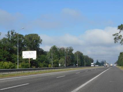 Billboard B in Kiev roads Trasa M-06 "Kiiv-Cop" (Zitomir), km 44+000 livo, cerez 800m pisla povorotu na Motizin ta avtobusnoi zupinki, za 500m do zavodu "Ruukki" Photo 1