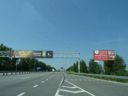 Billboard A in Berezivka (Kiev region) s. Berezivka, trasa M-06 "Kiiv-Cop" (Zitomir), km 40+100 pravo, za 250m do avtobusnoi zupinki "Severinivka", cerez 500m pisla AZS AMIK Photo 1