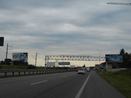 Billboard B in Kiev roads Dniprovs'ke sose, trasa N-01 "Kiiv-Znam'anka", km 22+050 livo, ZK "BASA Sity", za 400m do AZS OKKO Photo 1