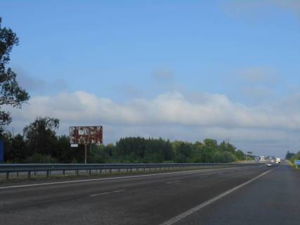 Billboard B in Kiev roads Trasa M-06 "Kiiv-Cop" (Zitomir), km 41+370 livo, povorot na kotedzne mistecko "Nimec'ka sloboda" Photo 1