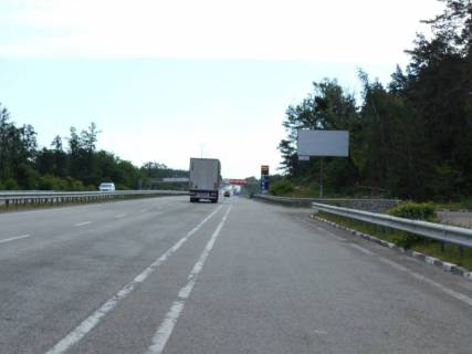 Billboard A in Berezivka (Kiev region) s. Buzova, trasa M-06 "Kiiv-Cop" (Zitomir), km 36+150 livo, cerez 150m pisla TIR avtomobil'noi stoanki, cerez 750m pisla restoranu "Bistro Pekara", cerez 850m pisla otelu "Mezon Blans", za 200m do AZS BRSM-Nafta Photo 1