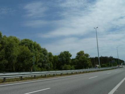 Billboard B in Buzova s. Buzova, trasa M-06 "Kiiv-Cop" (Zitomir), km 35+200 pravo, za 250m do avtobusnoi zupinki ta povorotu na st. Lenina, cerez 600m pisla AZS BRSM-Nafta Photo 1