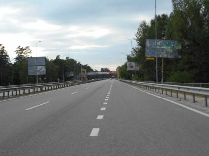 Billboard A in Romankiv Dniprovs'ke sose, trasa N-01 "Kiiv-Znam'anka", km 28+460 livo, navproti restoranu "Tri musketeri", za 450m do restoranu "Cumac'kij slah", cerez 250m pisla restoranu "Forest Grill" Photo 1