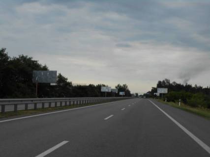 Billboard B in Kiev roads Dniprovs'ke sose, trasa N-01 "Kiiv-Znam'anka", km 35+450 livo, za 670m do z/d stancii, cerez 630m pisla povorotu na s. Novi Bezradici Photo 1