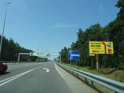 Billboard A in Berezivka (Kiev region) s. Berezivka, trasa M-06 "Kiiv-Cop" (Zitomir), km 36+250 pravo, navproti TIR avtomobil'noi stoanki, cerez 350m pisla AZS BRSM-Nafta, za 650m do restoranu "Bistro Pekara", za 750m do otelu "Mezon Blans" Photo 1