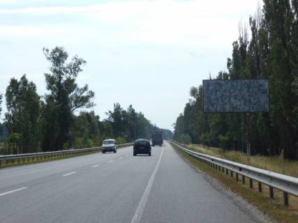 Billboard A in Vorzel smt. Vorzel', trasa M-07 "Kiiv-Kovel'", km 35+700 livo, cerez 1.1km pisla povorotu na st. Central'na, cerez 1.4km pisla AZS BRSM Nafta, za 1.2km do povorotu na st. Parkova Photo 1
