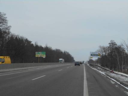 Billboard A in Glevakha smt. Kalinivka, trasa M-05 Kiiv-Odesa, km 29+650 livo, za 650m do povorotu na st. Vokzal'na ta AZS KLO, cerez 850m pisla AZS AMIK Photo 1