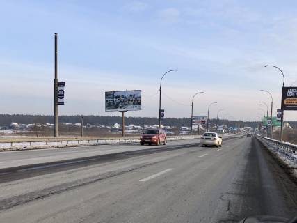 Billboard B in Irpin, 6*3  viizd z Irpena na Irpins'ku trasu, vzdovz mostu cerez r. Irpin', pered Romanivkou Photo 1