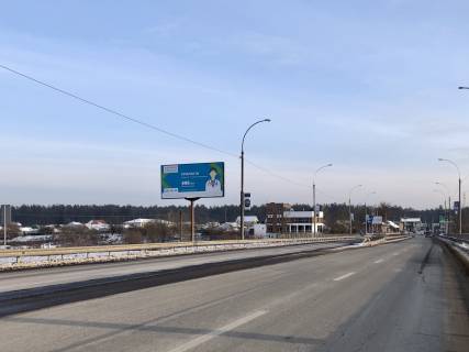 Billboard B in Irpin, 6*3  viizd z Irpena na Irpins'ku trasu, vzdovz mostu cerez r. Irpin', pered Romanivkou Photo 1