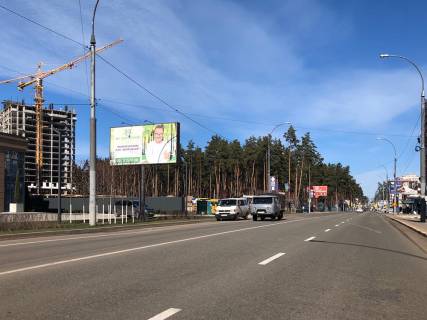 Billboard B in Irpin, 6*3  st. Universitets'ka, bila ZK <<Central'nij>> (v napramku z Kieva) Photo 1