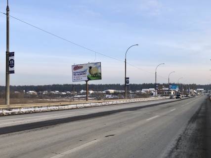 Billboard B in Irpin, 6*3  viizd z Irpena na Irpins'ku trasu, vzdovz mostu cerez r. Irpin', pered Romanivkou Photo 1