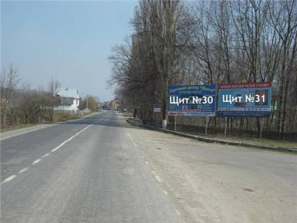 Billboard A in Tyachiv smt.Solotvino, st. Tacivs'ka, v storonu m.Rahiv, bila AZS,gotelu,avtomijki. Photo 1