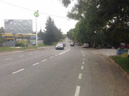 Billboard A in Uzhgorod, Біл-борд  m. Uzgorod, st. Sobranec'ka, 180, vizd v misto, bila AZS Motto zi storoni Slovac'kogo kordonu Photo 1
