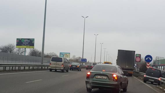 Billboard B in Mila, 3х6  M-06 Kiev-Zitomir 26 km 400 m Photo 1