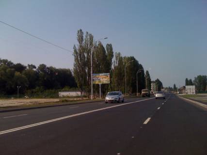 Billboard B in Vishgorod, 3x6  Naberezna, drugij vid povorotu na prospekt Sevcenka, 150m do zupinki "Kinoteatr MIR" naav. u Kiiv Photo 1