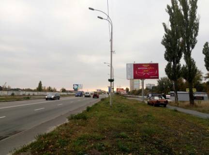 Billboard A in Vishgorod, 3x6  Naberezna, drugij vid povorotu na prospekt Sevcenka, 150m do zupinki "Kinoteatr MIR" naav. z Kieva Photo 1