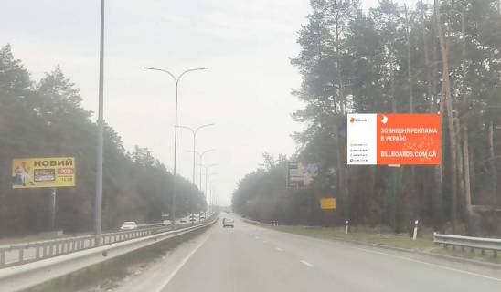 Billboard A in Vishgorod, 6x3  550 m. pisla povorotu z avtomobil'nou dorogi R-02 "Kiiv-Ivankiv-Ovruc" na avtomobil'nu dorogu R-69 "Kiiv-Visgorod-Desna-Cernigiv", u napramku st. Bogatirs'kij, m. Kiiv, pravoruc Photo 1