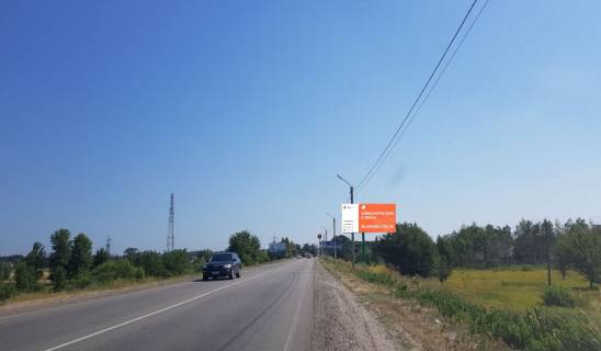 Billboard A in Khotnivka, 6x3  avtomobil'na doroga R-69 "Kiiv-Visgorod-Desna-Cernigiv", 1350 m. pisla povorotu na masiv "Mizricca", pravoruc, u napramku z m.Visgoroda v s. Hotanivka. Photo 1