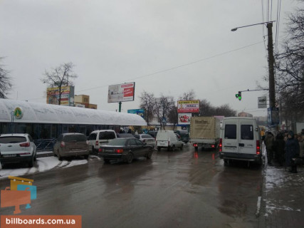 Billboard A in Kam'yanets-Podilsky, 6х3  av. Grusevs'kogo (zupinka bila Central'nogo rinku) (na Cernivci) Photo 1