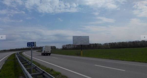 Billboard A in Zvyagel (Novograd-Volinsky), 6x3  Trasa Kiiv-Cop. Ob'izna Zvagela, naproti zavodu Cersanit No 2, napramok na Zitomir st.A Photo 1