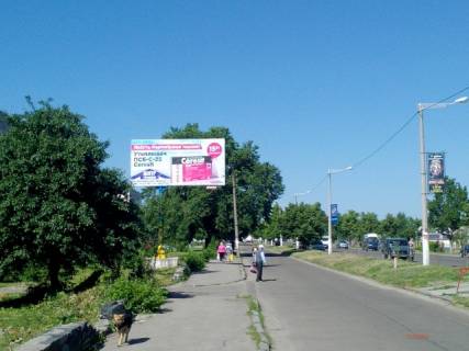 Billboard B in Korostishiv, 6x3  Korostisiv v. Kiivs'ka 103 (GUS'̱), central'na st., napramok z Kieva na Zitomir, naproti s/m "FURSET",st.B Photo 1