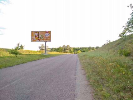Billboard B in Novomykolayivka, 3x6  смт Новомиколаївка, виїзд на Сурсько-Литовське Photo 1
