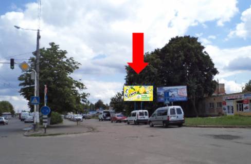 Billboard  in Zhytomyr, 3x6  Nezaleznosti av. (kol. Vatutina st.), 18 / Otamaniv Sokolovs'kih st. (kol. Potapova st.), v bik vokzalu, bila supermarketu "Ekomarket", na svitlofori Photo 1