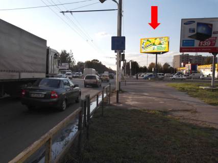 Billboard A in Zhytomyr, 3x6  Nezaleznosti av. (kol. Vatutina st.) / Otamaniv Sokolovs'kih st. (kol. Potapova st.), v bik Pokrovs'koi st. (kol. Sorsa st.), bila supermarketu "Ekomarket", na svitlofori Photo 1