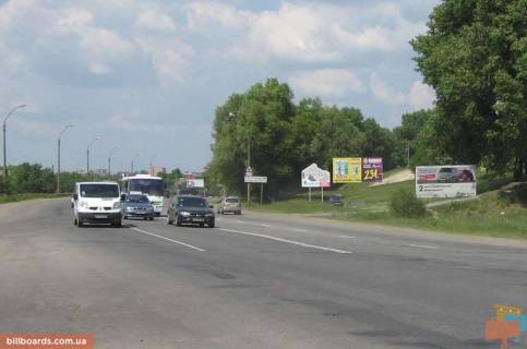 Billboard A in Khmelnitsky Kam'anec'ka st., v'izd v misto, z boku m. Kam'anec'-Podil's'kij Photo 1