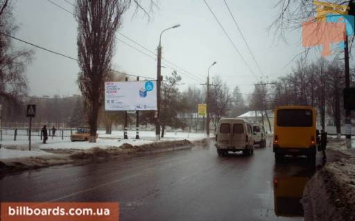 Billboard B in Sumi Kondrat'eva st. (kolis. Kirova st.) - Gamalia st., v centr Photo 1