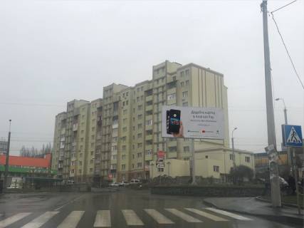 Billboard A in Rivne Bogoavlens'ka st. (kolis. Cernaka st.) - Konoval'ca st., bila TRC "Sky Up" Photo 1