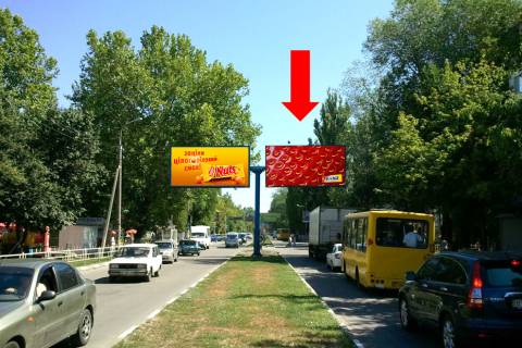 Billboard A in Kherson, 3x6  Universitets'ka st. (kol. 40-ricca Zovtna st.) / Miru st., bila rinku "Dniprovs'kij", rozdil'nik, z centru, prava Photo 1