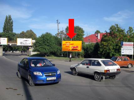 Billboard A in Uzhgorod, 3x6  Buditeliv st. / Ankudinova st., v bik vokzalu Photo 1