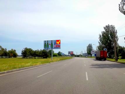 Billboard A in Dnipro (Dnipropetrovsk), 6х3  st.Nab. Zavods'ka, rozpodiluvac, "L'odova arena", v centr Cervonij Kamin', Parus Photo 1