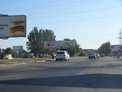 Billboard A in Dnipro (Dnipropetrovsk), 6х3  Донецьке шосе – вул.Березинська (перед поворотом на ТРЦ Караван), рух до Каравану, ліворуч Photo 1